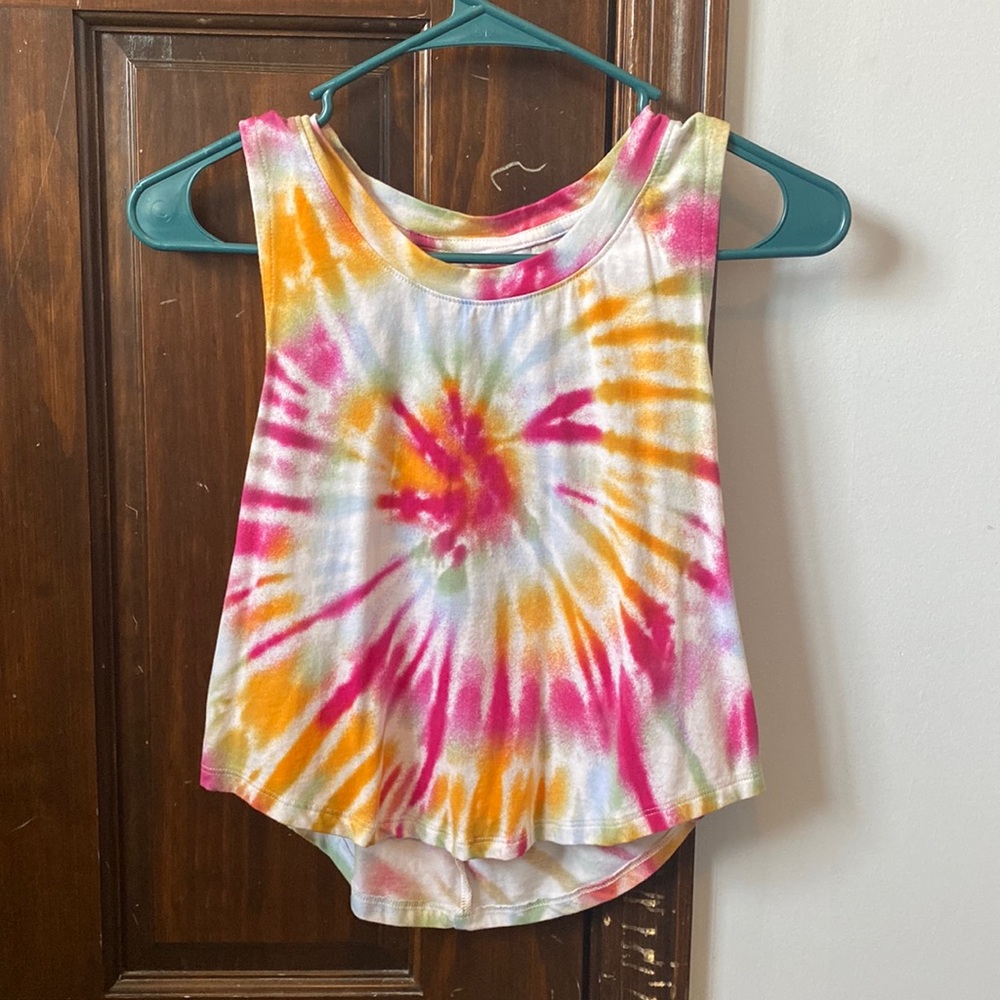 A cropped tie dye tank top with a cute twisted and open back!